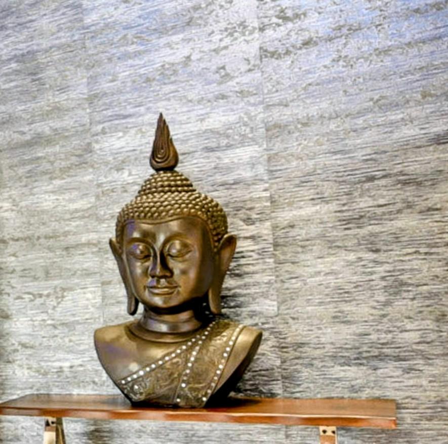 Bronze Buddha sculpture used as a decorative home accessory