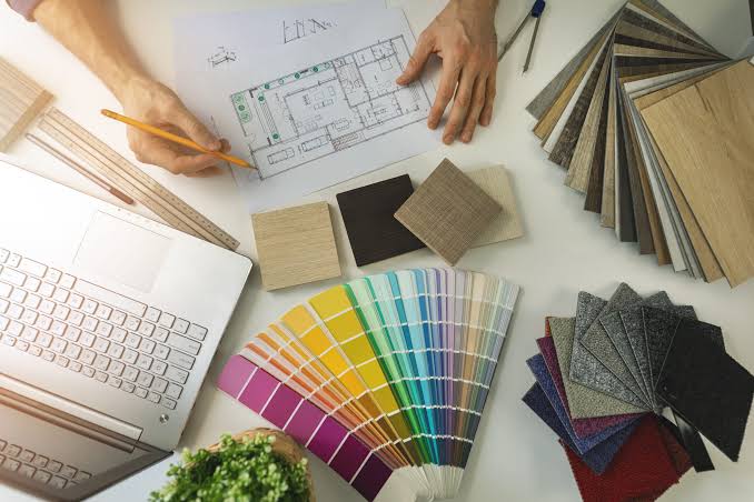 Interior designer Southwest Florida selecting paint colors, fabric, and finishes